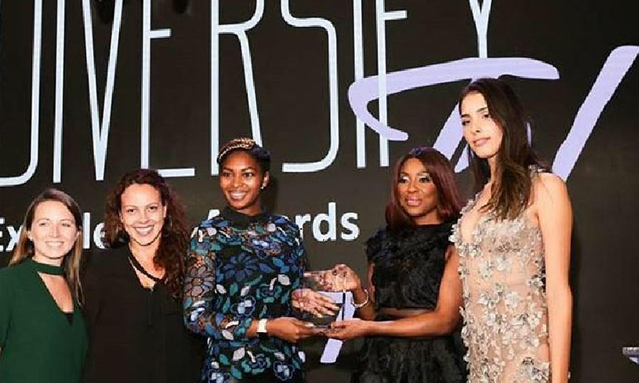 Mo Abudu, CEO of EbonyLife TV, 2nd right, presenting the award for Representation of Race & Ethnicity, Scripted