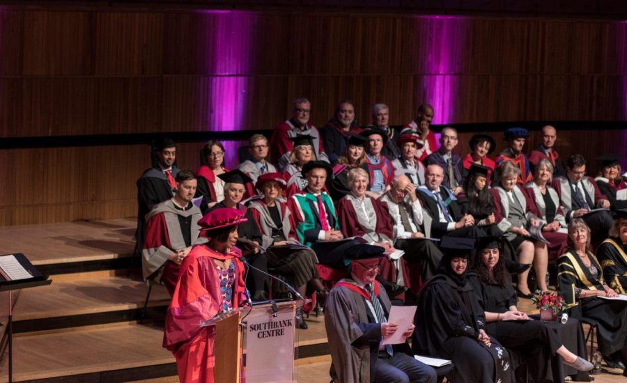 Mo Abudu on stage delivering a speech at the University of Westminster, UK, during the university’s annual graduation ceremony at the prestigious Royal Festival Hall in London.